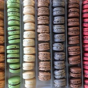 Loose French macarons in a tray
